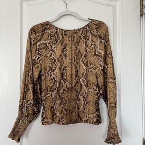 Snake print blouse from H&M in a size small for sale